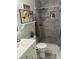 Bathroom featuring modern fixtures, a sink with vanity, and a walk-in shower at 1677 Grey Fox Ct, Lawrenceville, GA 30044