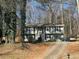 Well-maintained two-story home with an attached garage and a neatly kept front yard at 1677 Grey Fox Ct, Lawrenceville, GA 30044