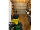 Organized garage with storage racks and equipment at 1677 Grey Fox Ct, Lawrenceville, GA 30044