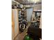 This garage is an uncluttered area for storage, featuring shelving and equipment at 1677 Grey Fox Ct, Lawrenceville, GA 30044