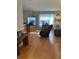 Comfortable living room with hardwood floors and a recliner near a sunny window at 1677 Grey Fox Ct, Lawrenceville, GA 30044