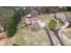 Single-Gathering home on an expansive lot with mature trees and a long driveway at 181 Pinehurst Ln, Marietta, GA 30068