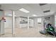 Spacious basement area includes a gym, kitchenette, and durable floors at 181 Pinehurst Ln, Marietta, GA 30068