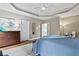 Spacious bedroom featuring a dresser, ensuite bathroom, and stylish decor at 181 Pinehurst Ln, Marietta, GA 30068