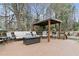 Expansive outdoor deck with gazebo and seating area, perfect for entertaining or relaxing in nature at 181 Pinehurst Ln, Marietta, GA 30068