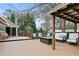 Spacious deck featuring a covered seating area, ideal for relaxing and enjoying the outdoor living space at 181 Pinehurst Ln, Marietta, GA 30068