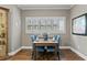 Bright breakfast nook featuring hardwood floors, bright window, and stylish furnishings at 181 Pinehurst Ln, Marietta, GA 30068