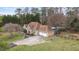 Well-maintained single-Gathering home with a two-car garage and large front lawn at 181 Pinehurst Ln, Marietta, GA 30068