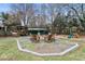Backyard fire pit with seating and a play area, creating an inviting outdoor entertainment space at 181 Pinehurst Ln, Marietta, GA 30068