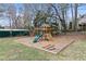 Backyard playground area with a slide and climbing structure, perfect for Gathering fun and activities at 181 Pinehurst Ln, Marietta, GA 30068