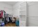 Walk-in closet with built-in shelving and ample storage space at 181 Pinehurst Ln, Marietta, GA 30068