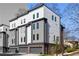 Modern townhome showcases a stylish exterior with a private garage at 1836 Memorial Dr # 303, Atlanta, GA 30317