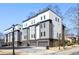 Modern townhomes with stylish exteriors, private garages, and landscaped surroundings at 1836 Memorial Dr # 303, Atlanta, GA 30317