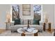 Bright living room with hardwood floors, modern furniture, and large windows offering natural light at 1836 Memorial Dr # 303, Atlanta, GA 30317