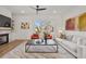 Comfortable living room with fireplace, neutral walls, hardwood floors, and an outside view at 1836 Memorial Dr # 303, Atlanta, GA 30317