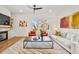 Bright living room with fireplace, large windows, and modern furnishings at 1836 Memorial Dr # 303, Atlanta, GA 30317