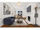 Bright living room featuring hardwood floors, a fireplace, and modern decor at 1446 Metropolitan Se Ave, Atlanta, GA 30316