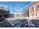 Street view showcasing a city intersection with a brick building and signage at 1446 Metropolitan Se Ave, Atlanta, GA 30316