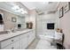 Bathroom featuring granite countertops, vanity with sink, shower and toilet at 2225 Johnson Ferry Rd., Marietta, GA 30062