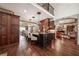 Spacious kitchen with a central island, custom cabinetry, and views of the adjacent living spaces at 2225 Johnson Ferry Rd., Marietta, GA 30062