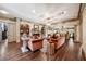 Sophisticated living room with decorative ceiling, hardwood floors, custom built-ins, and plush seating at 2225 Johnson Ferry Rd., Marietta, GA 30062