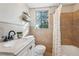 Charming bathroom featuring classic fixtures and tiled shower and walls at 2230 Cheshire Bridge Ne Rd # 116, Atlanta, GA 30324