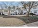 Charming courtyard with landscaping in front of apartments with painted doors at 2230 Cheshire Bridge Ne Rd # 116, Atlanta, GA 30324