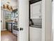 The kitchen area shows an adjacent closet featuring a stacked washer and dryer at 2230 Cheshire Bridge Ne Rd # 116, Atlanta, GA 30324