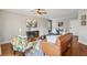 Spacious living area with hardwood floors, a sofa, and an adjacent dining area at 2230 Cheshire Bridge Ne Rd # 116, Atlanta, GA 30324