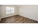 Cozy bedroom with hardwood floors and a bright window at 3641 Oakleaf Pass, Fairburn, GA 30213