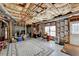 Unfinished basement area with exposed ceiling and some storage at 1301 Dayspring Trce, Lawrenceville, GA 30045