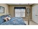 Bedroom featuring a bed and large window for natural light at 1301 Dayspring Trce, Lawrenceville, GA 30045