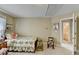 Cozy bedroom with twin bed, neutral walls and an en-suite bathroom at 1301 Dayspring Trce, Lawrenceville, GA 30045