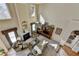 High-angle view of the living room showcasing the fireplace, built-in shelving, and an open floor plan at 1301 Dayspring Trce, Lawrenceville, GA 30045