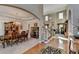View of dining and living spaces featuring hardwood floors and elegant furnishings at 1301 Dayspring Trce, Lawrenceville, GA 30045