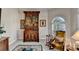 Comfortable sitting area with antique furniture and a large window at 1301 Dayspring Trce, Lawrenceville, GA 30045