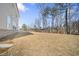 Large grassy backyard offers ample space for outdoor activities and relaxation at 1761 Dosk Ave, Lawrenceville, GA 30044