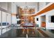 Expansive game room with pool table, fireplace, and soaring ceilings for social gatherings at 860 Peachtree Ne St # 2001, Atlanta, GA 30308