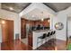 Well-appointed kitchen with stainless steel appliances, breakfast bar, and modern lighting fixtures at 860 Peachtree Ne St # 2001, Atlanta, GA 30308
