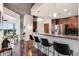 Stylish kitchen with stainless steel appliances, granite countertops, and breakfast bar seating at 860 Peachtree Ne St # 2001, Atlanta, GA 30308