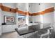 Resident lounge featuring a kitchenette with stylish counter seating and a large window showcasing the city at 860 Peachtree Ne St # 2001, Atlanta, GA 30308