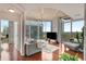 Bright living room with floor-to-ceiling windows offering stunning city views and hardwood floors at 860 Peachtree Ne St # 2001, Atlanta, GA 30308