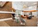 Well-appointed resident lounge featuring a stone fireplace, seating, and city views at 860 Peachtree Ne St # 2001, Atlanta, GA 30308
