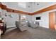Entertainment room with comfortable seating, integrated entertainment system, and natural light at 860 Peachtree Ne St # 2001, Atlanta, GA 30308