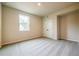 Bedroom with carpet, window and closet with double doors at 142 Henley St, Canton, GA 30114