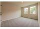 Bedroom with carpet and two large windows at 142 Henley St, Canton, GA 30114
