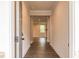Inviting home entryway featuring hardwood floors and a view into the open living space at 142 Henley St, Canton, GA 30114