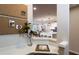 Cozy work nook with a bulletin board and a view of the kitchen and dining area at 264 Rockledge Sw Bnd, Powder Springs, GA 30127