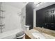 Updated bathroom featuring marble-style tile, granite countertops, and updated fixtures at 3087 Sanibel Sw Dr, Stone Mountain, GA 30087