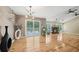 Spacious living room with hardwood floors, fireplace, and sliding glass door to the deck at 3087 Sanibel Sw Dr, Stone Mountain, GA 30087